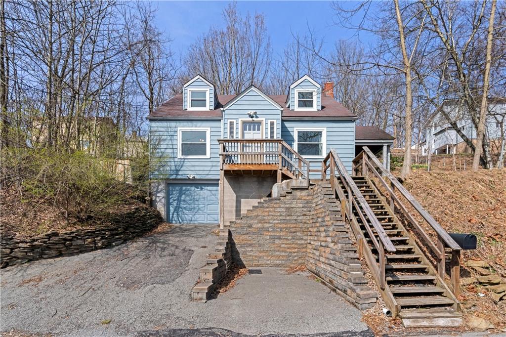 801 Maple Way Oakmont, PA 15139 - Photo 2 of 23 a front view of a house with large trees