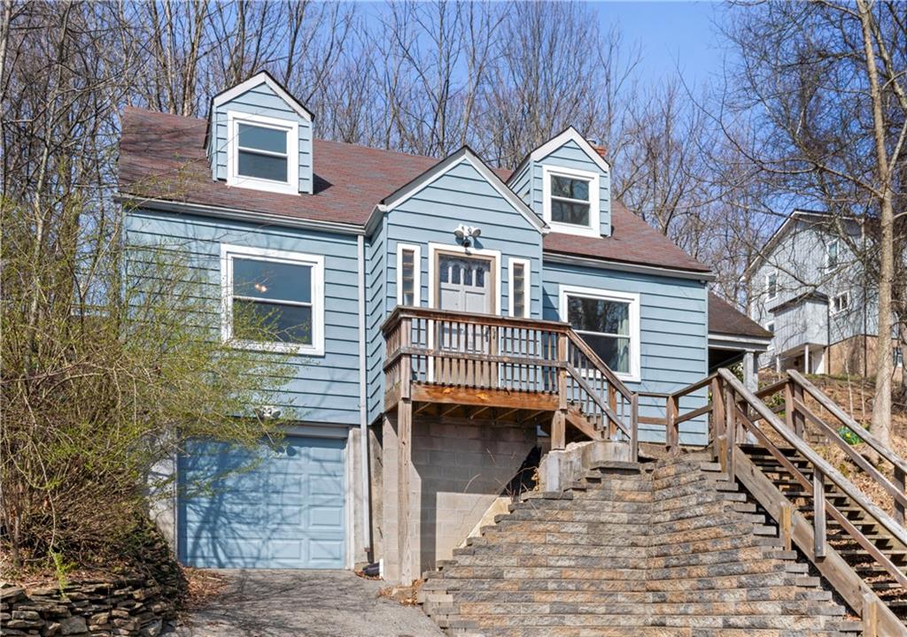 801 Maple Way Oakmont, PA 15139 - Photo 3 of 23 a front view of a house with parking area