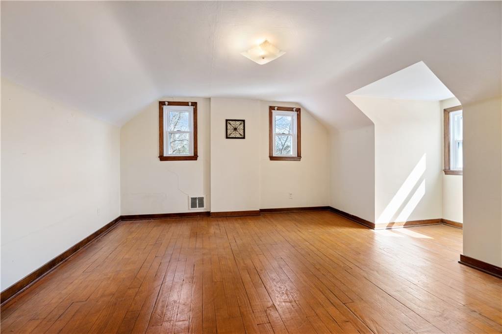 801 Maple Way Oakmont, PA 15139 - Photo 8 of 23 a view of a livingroom with wooden floor and a window