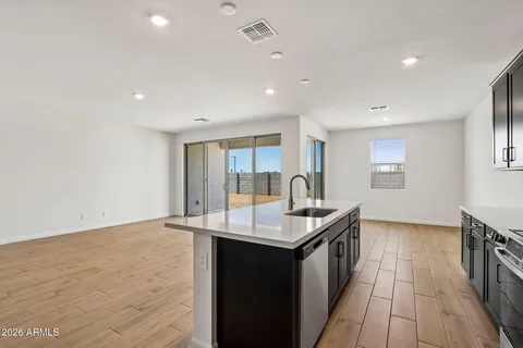 a bathroom with a toilet a sink and a mirror