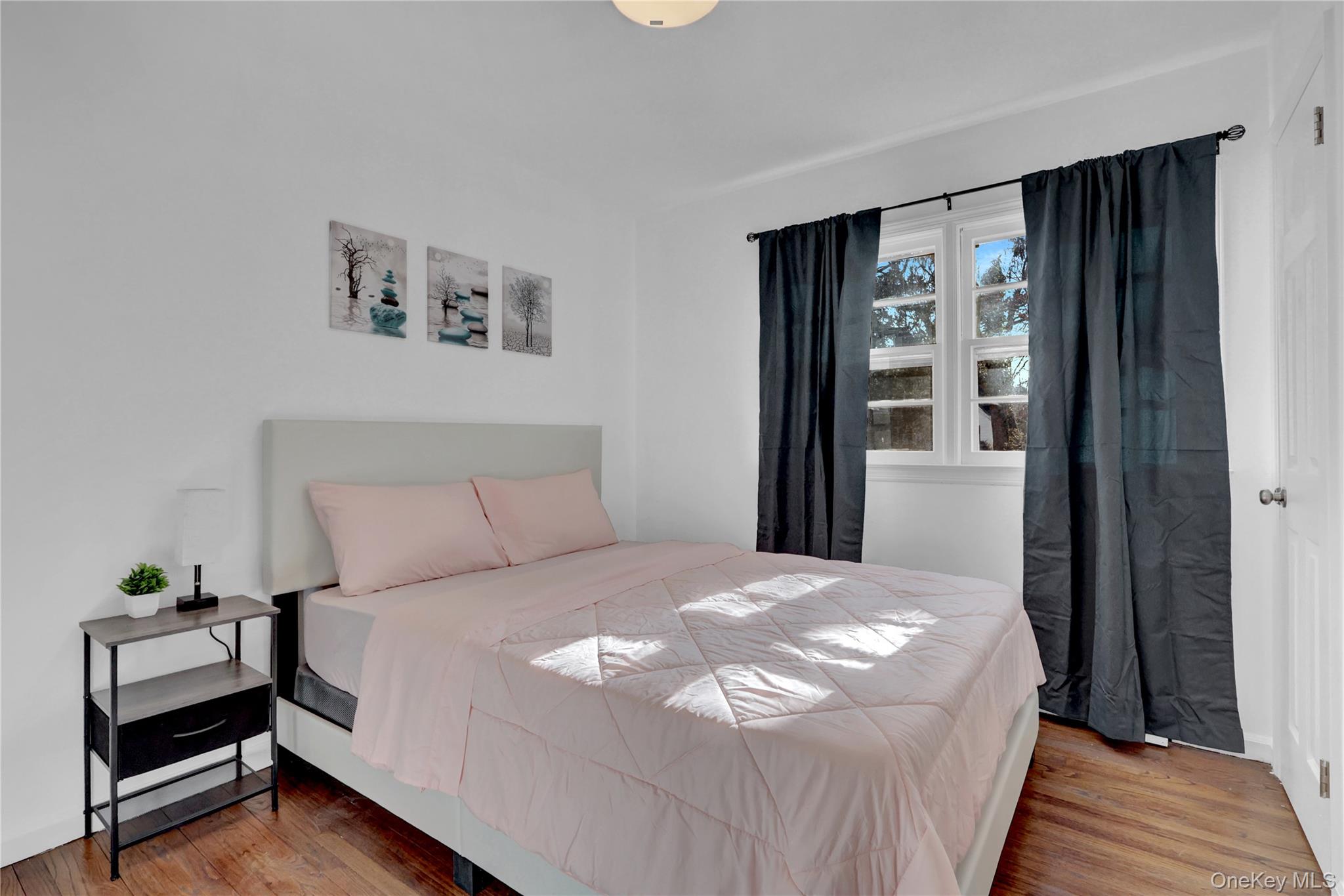 57 Middle Island Road Medford, NY 11763 - Photo 13 of 27 Bedroom with wood finished floors