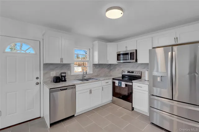 $669,000 | 57 Middle Island Road, Medford, NY 11763