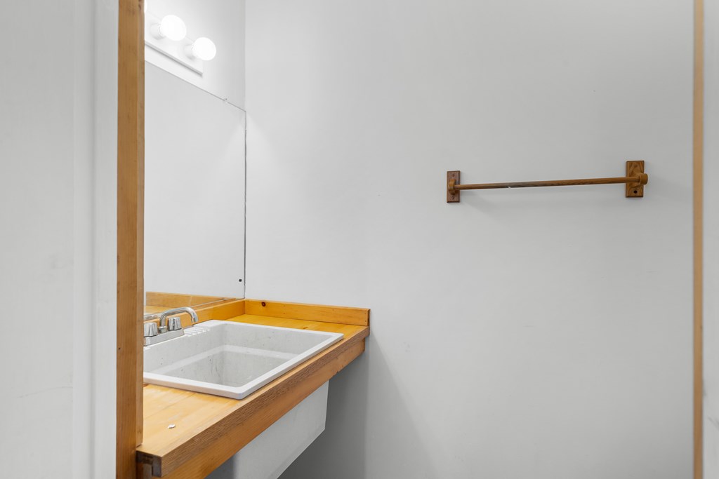 789 Jolley Way Epworth, GA 30541 - Photo 37 of 62 a bathroom with a sink and vanity