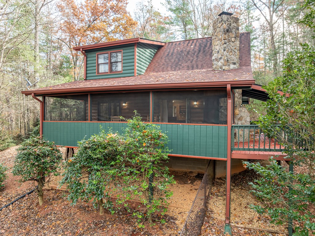 789 Jolley Way Epworth, GA 30541 - Photo 4 of 62 a front view of a house with garden
