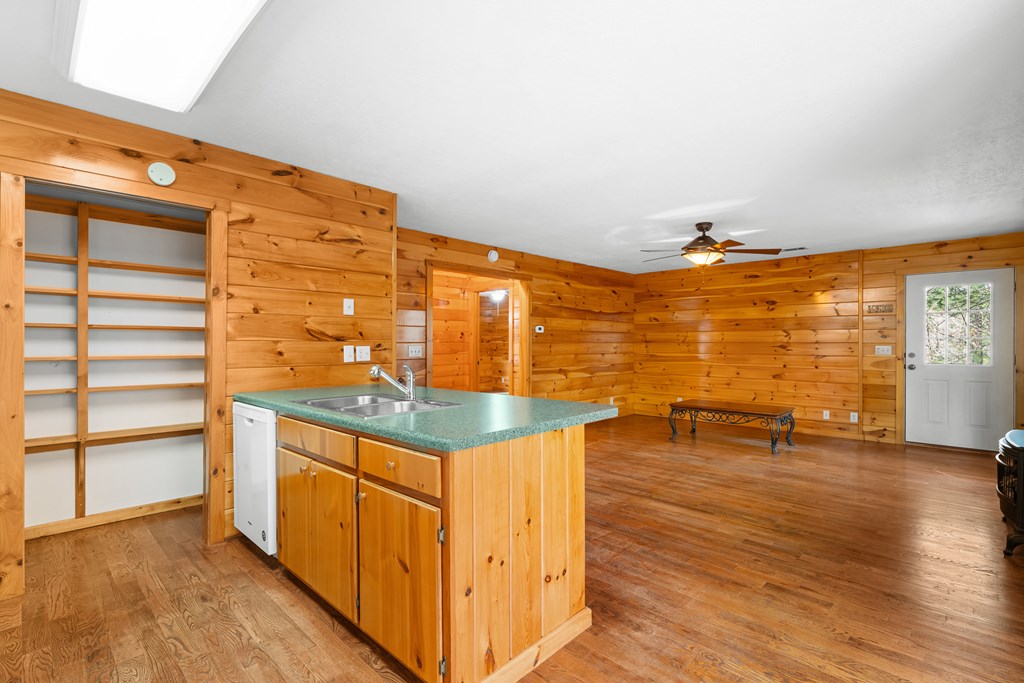 789 Jolley Way Epworth, GA 30541 - Photo 43 of 62 a view of a kitchen with furniture and wooden floor