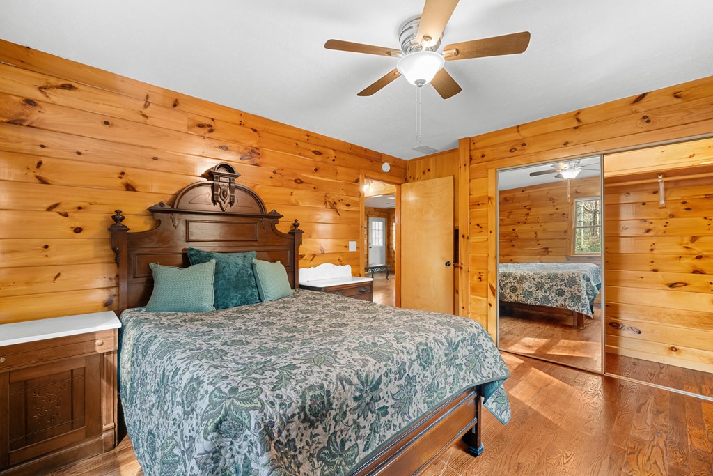 789 Jolley Way Epworth, GA 30541 - Photo 45 of 62 a bedroom with a bed and a walk in closet