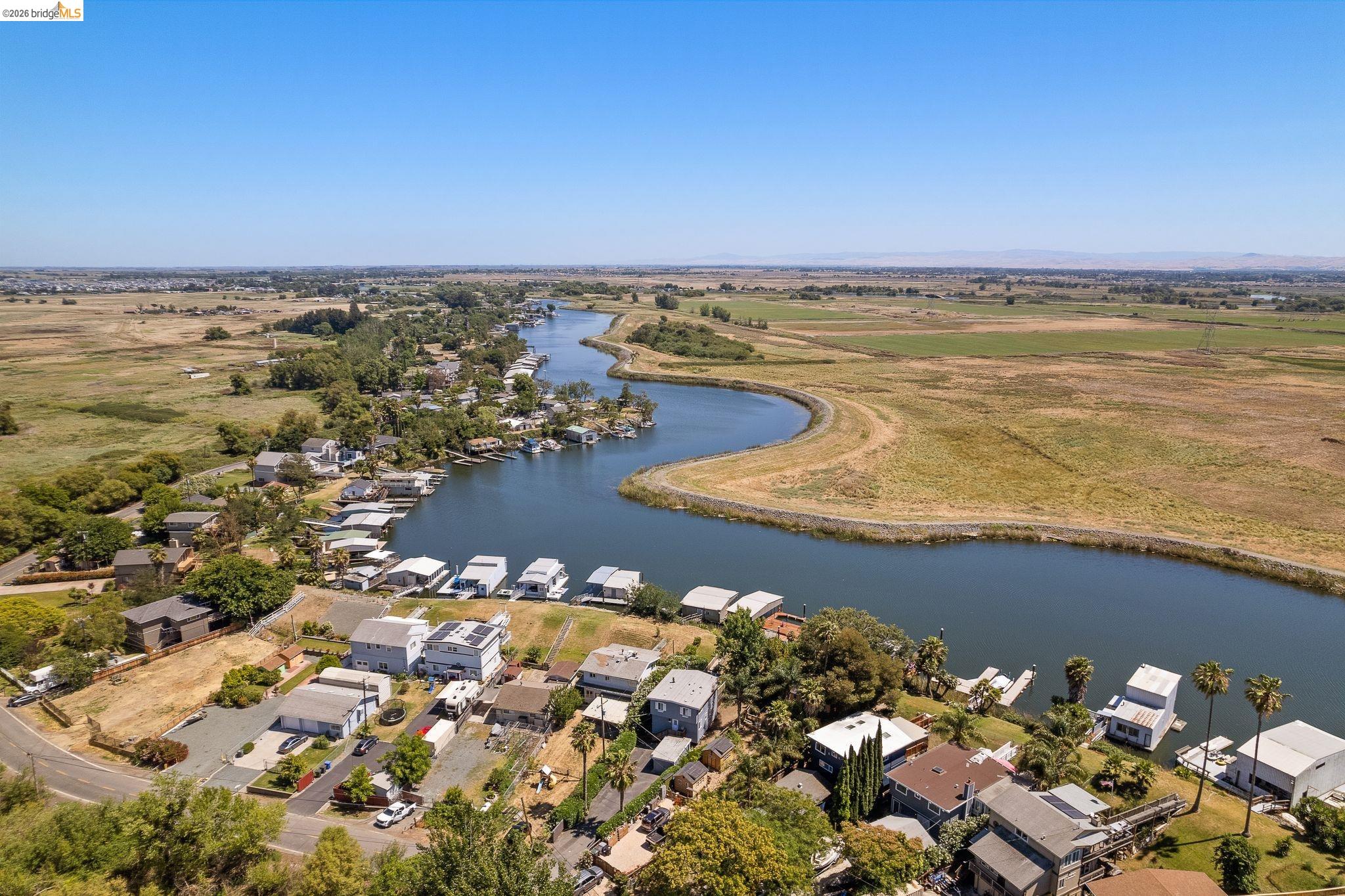 1704 Taylor Road Bethel Island, CA 94511 - Photo 68 of 73 Aerial perspective showcasing waterfront properties along a winding river