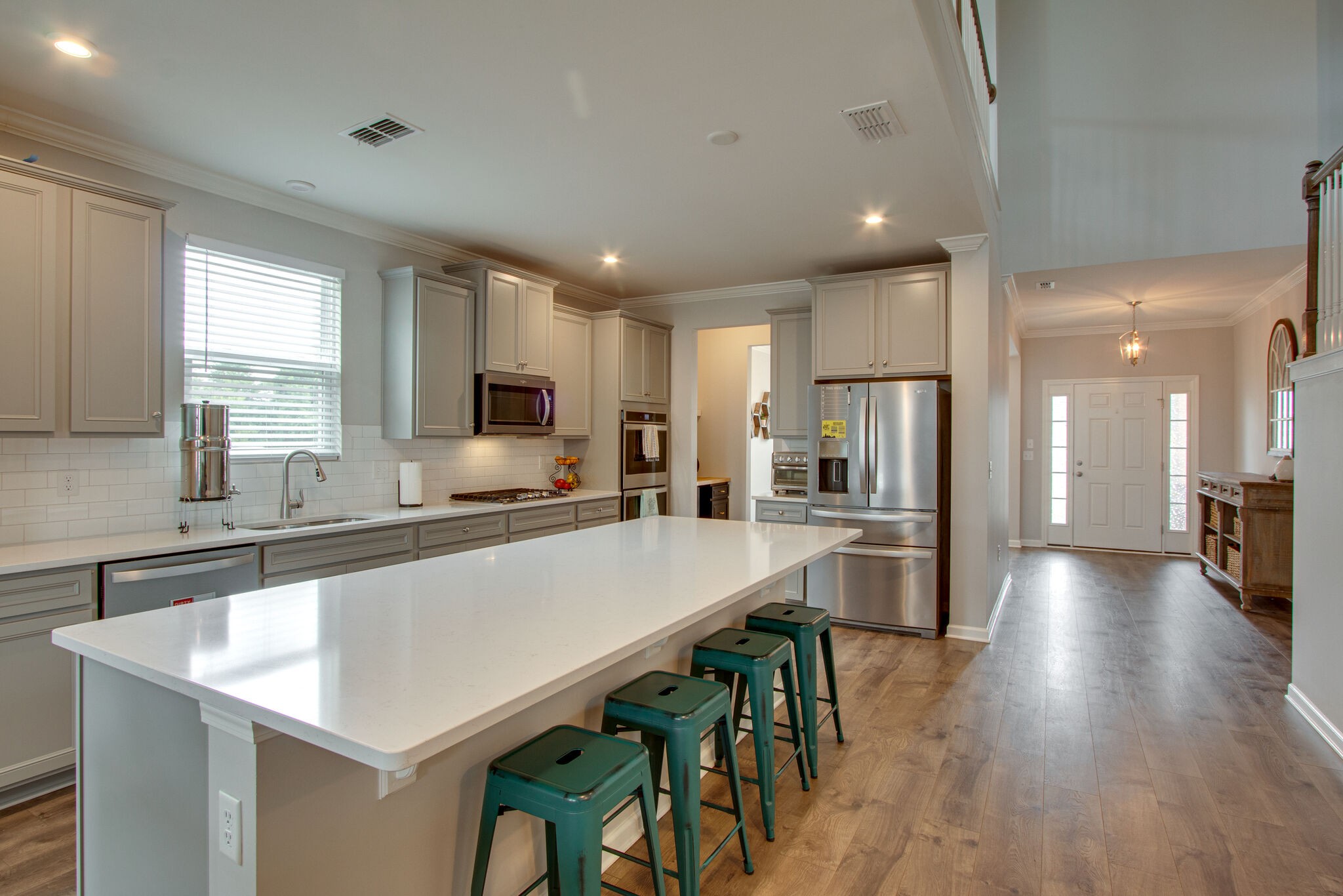 3329 Calendula Way Murfreesboro, TN 37128 - Photo 12 of 48 a large kitchen with lots of counter space a sink refrigerator and cabinets