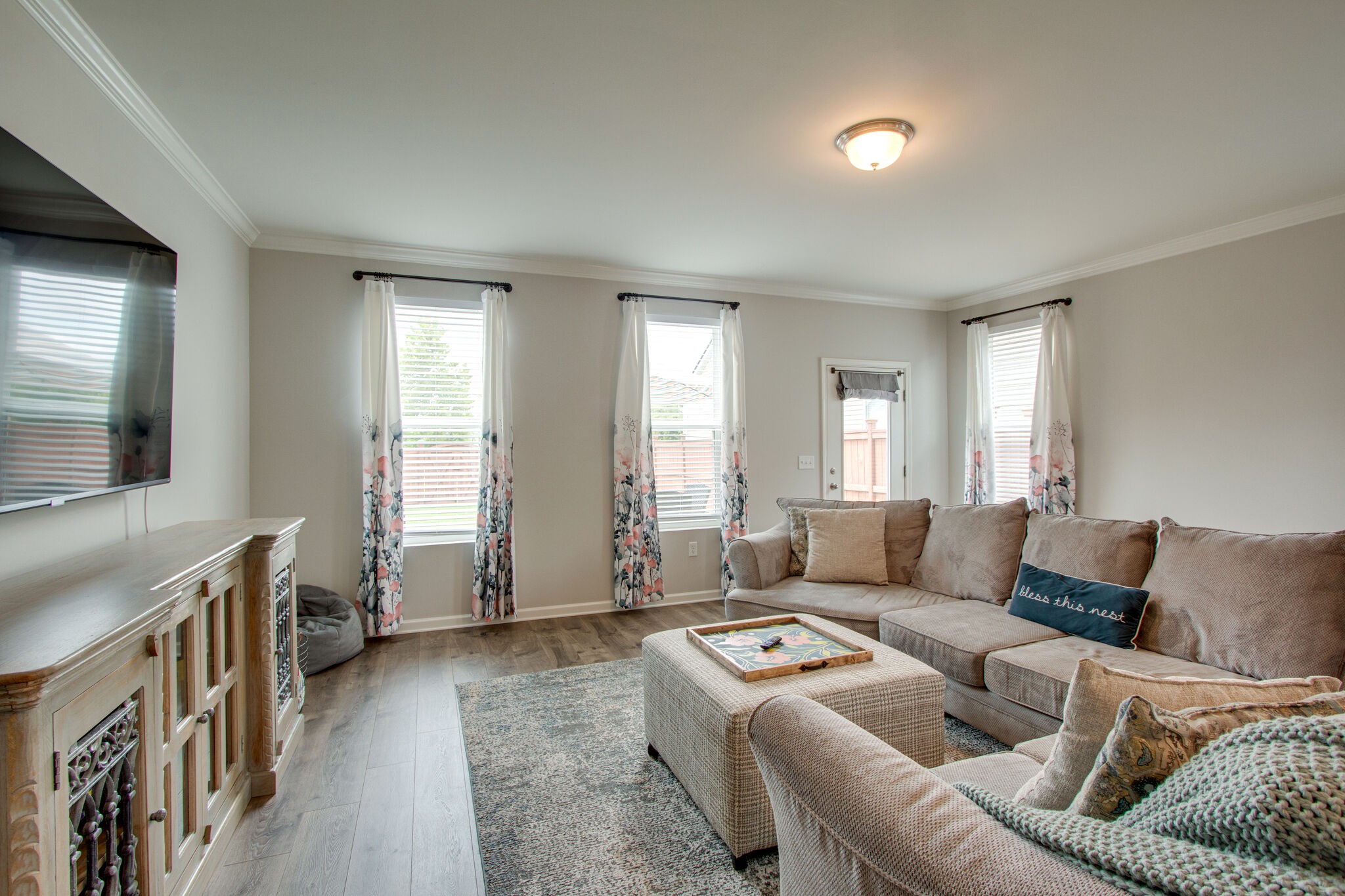 3329 Calendula Way Murfreesboro, TN 37128 - Photo 16 of 48 a living room with furniture and a flat screen tv