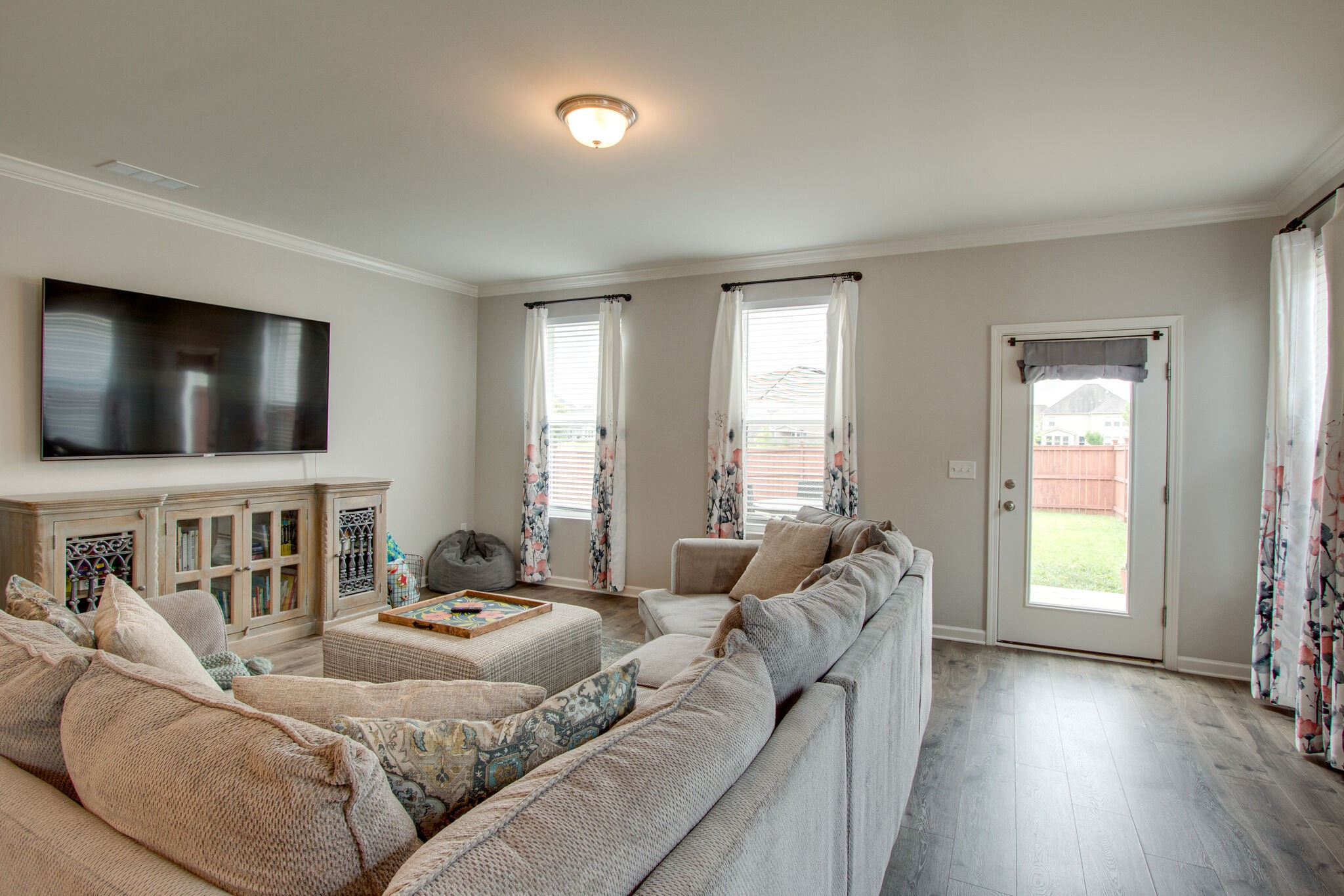 3329 Calendula Way Murfreesboro, TN 37128 - Photo 18 of 48 a living room with furniture and a flat screen tv