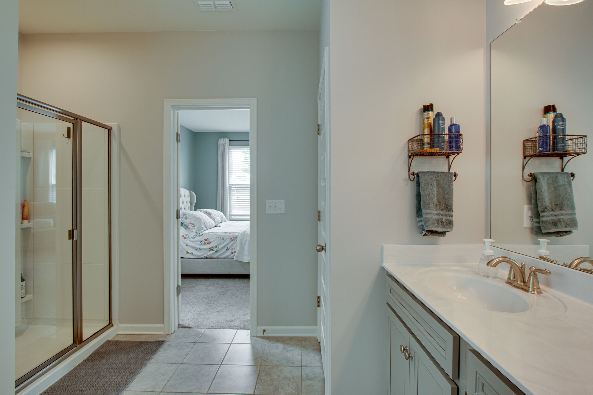 3329 Calendula Way Murfreesboro, TN 37128 - Photo 27 of 48 a en suite bathroom with a sink and a mirror