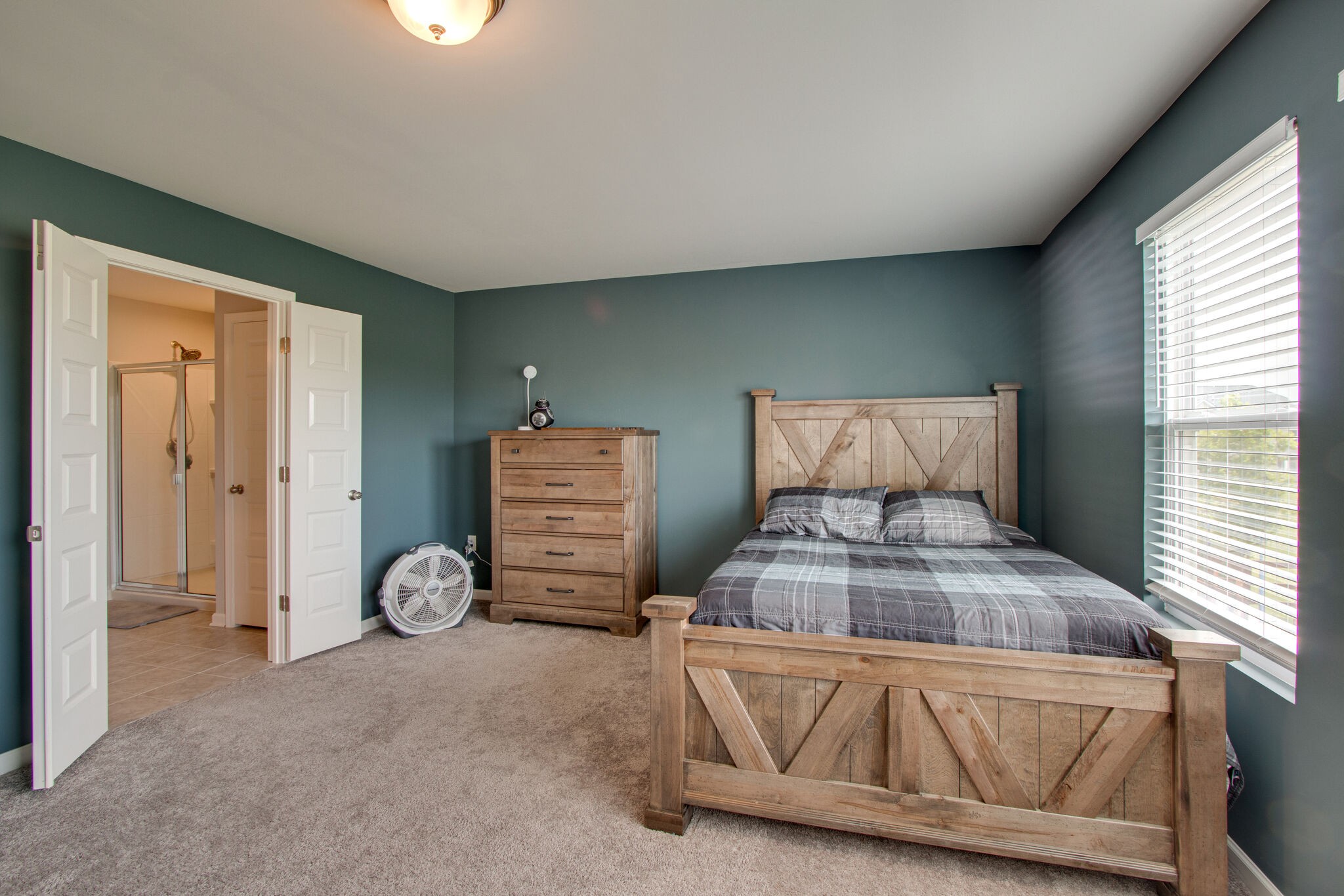 3329 Calendula Way Murfreesboro, TN 37128 - Photo 32 of 48 a bedroom with a bed and a window