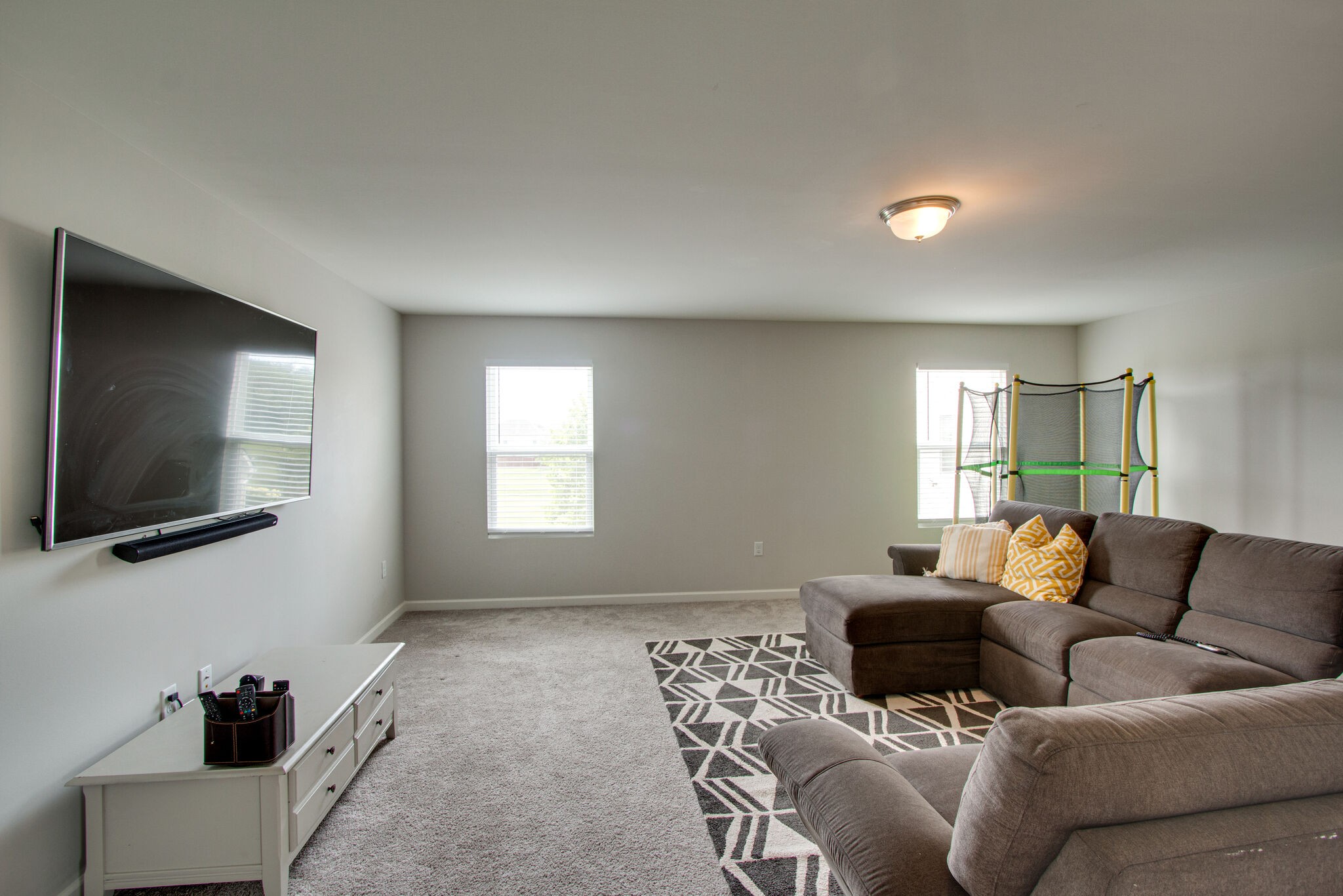 3329 Calendula Way Murfreesboro, TN 37128 - Photo 35 of 48 a living room with furniture and a flat screen tv