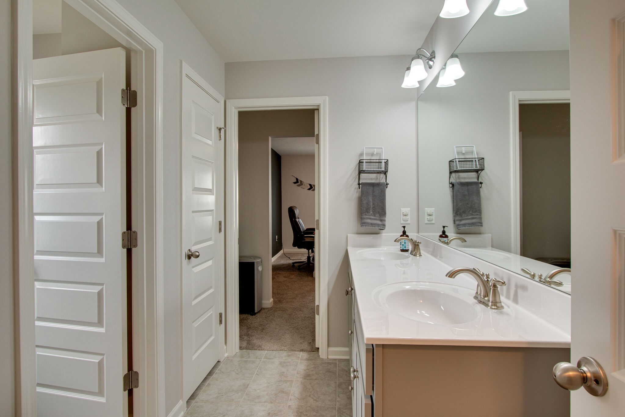 3329 Calendula Way Murfreesboro, TN 37128 - Photo 40 of 48 a en suite bathroom with a sink double vanity and mirror