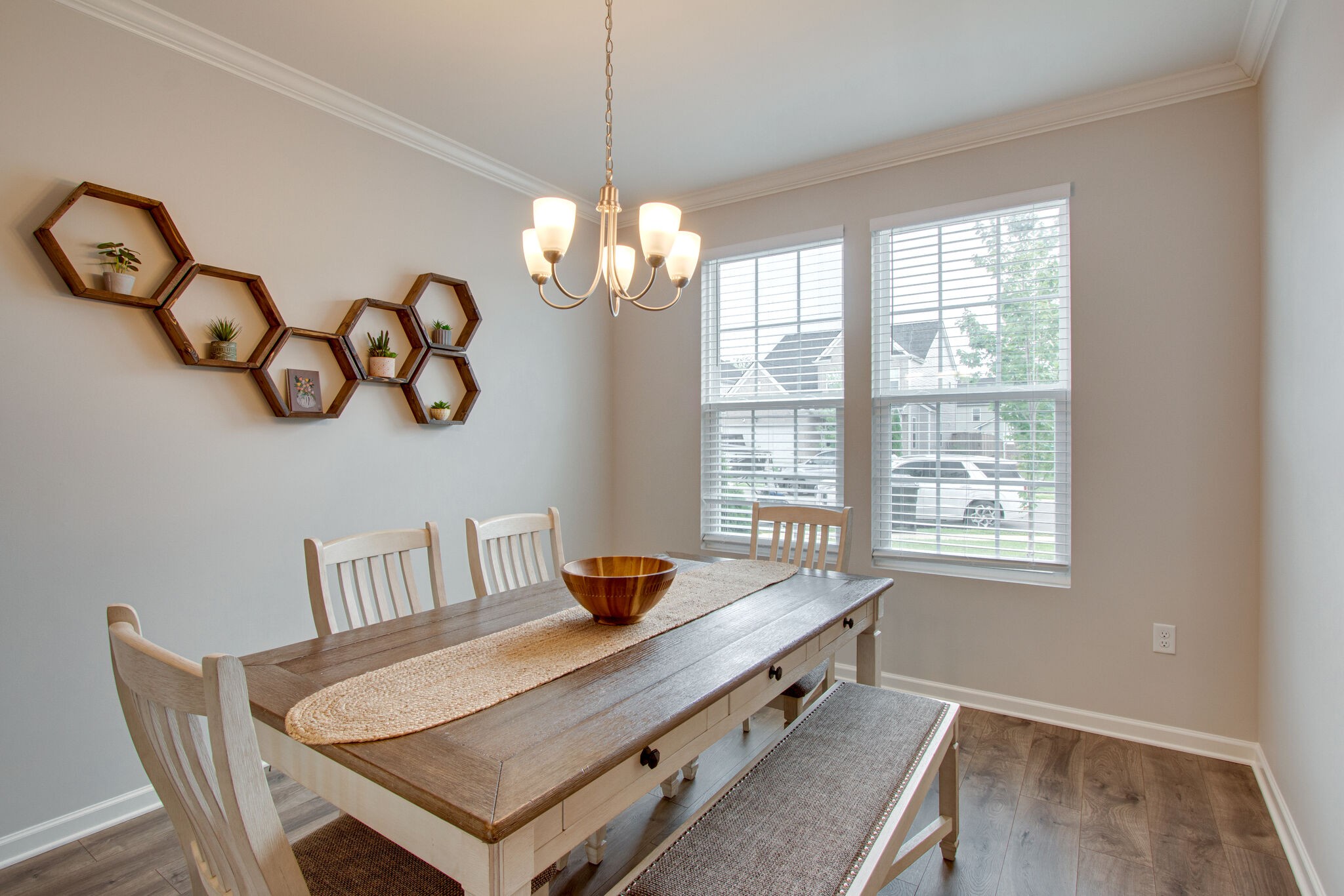 3329 Calendula Way Murfreesboro, TN 37128 - Photo 8 of 48 a view of a dining room with furniture wooden floor and chandelier