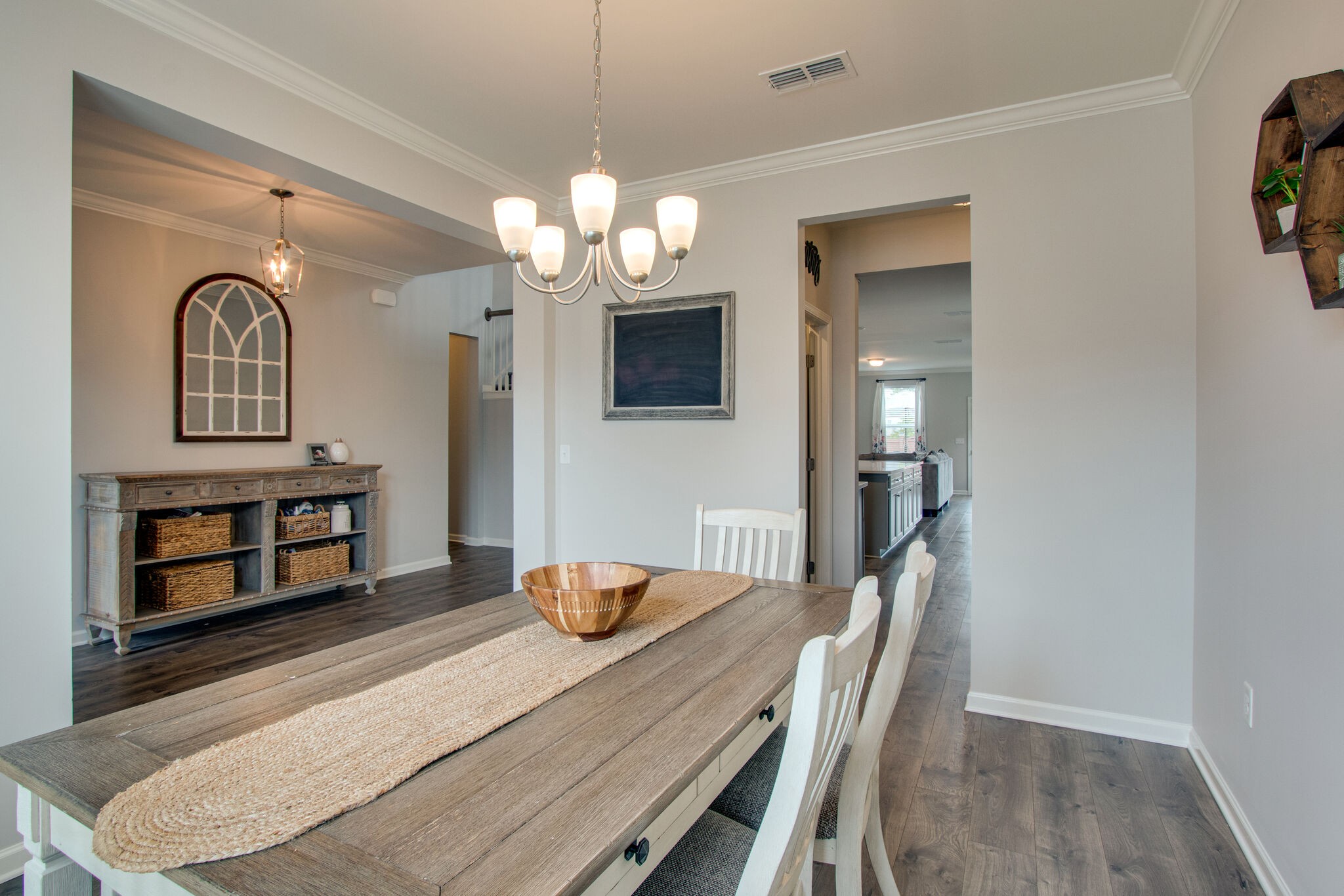 3329 Calendula Way Murfreesboro, TN 37128 - Photo 9 of 48 a view of a dining room with furniture and chandelier