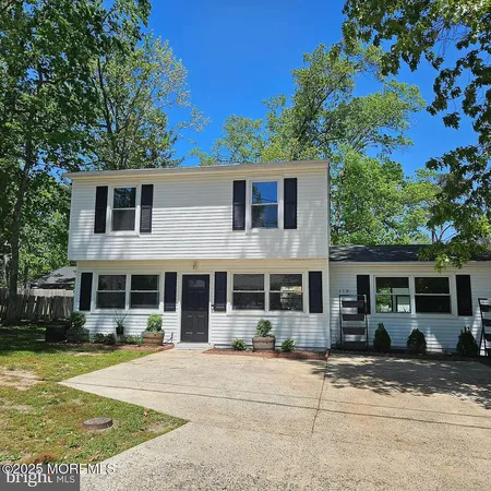 a house view with a outdoor space