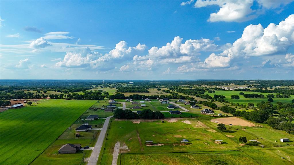 1160 Doss Road Millsap, TX 76066 - Photo 14 of 24 a view of a golf course with a swimming pool