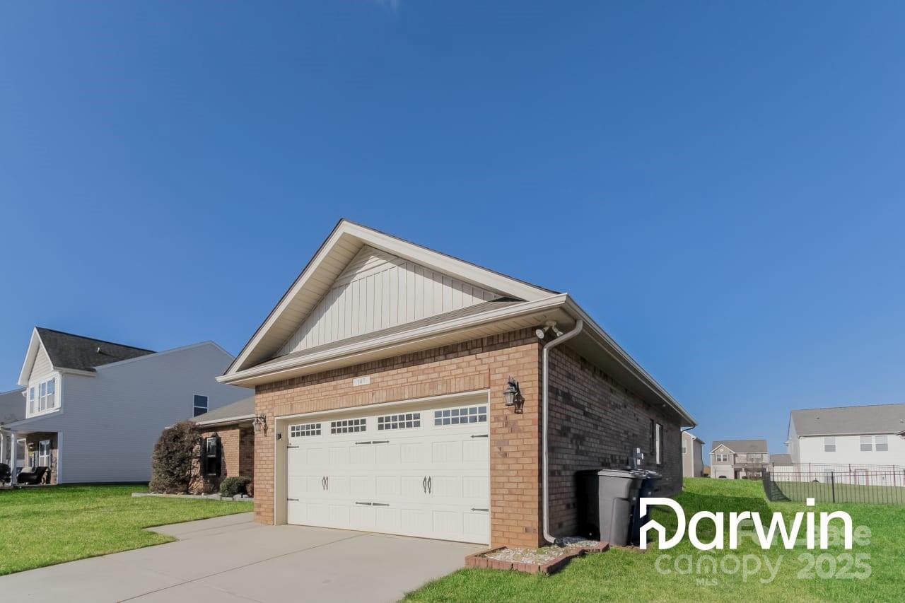 147 Water Ski Drive Statesville, NC 28677 - Photo 2 of 12 a view of a house with a yard