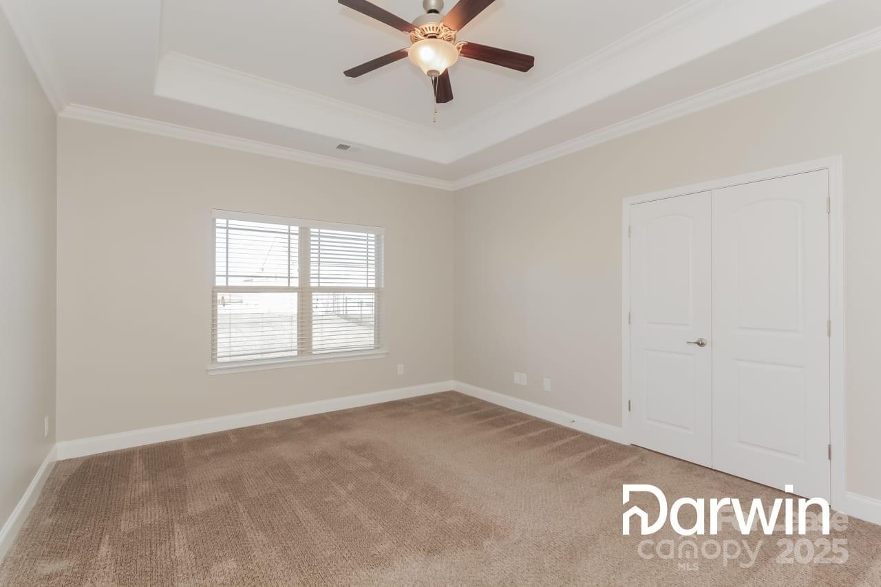 147 Water Ski Drive Statesville, NC 28677 - Photo 7 of 12 a view of a room with window and ceiling fan