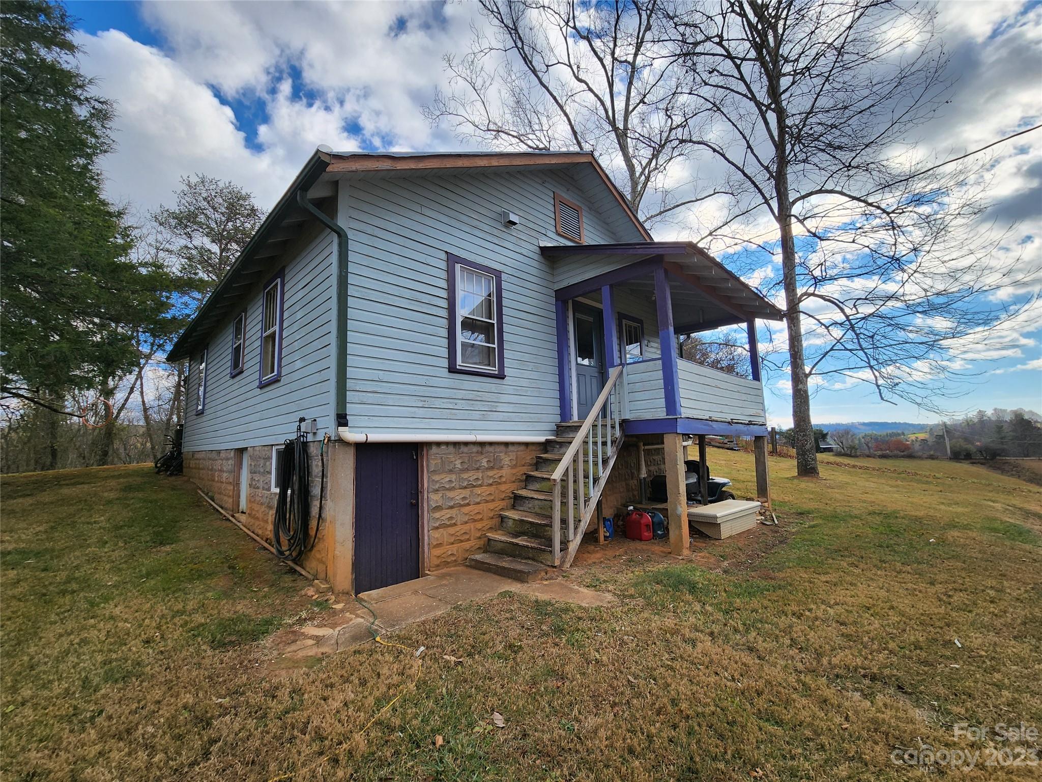 680 Cedar Hill Road Alexander, NC 28701 - Photo 13 of 17 a view of a house with a yard