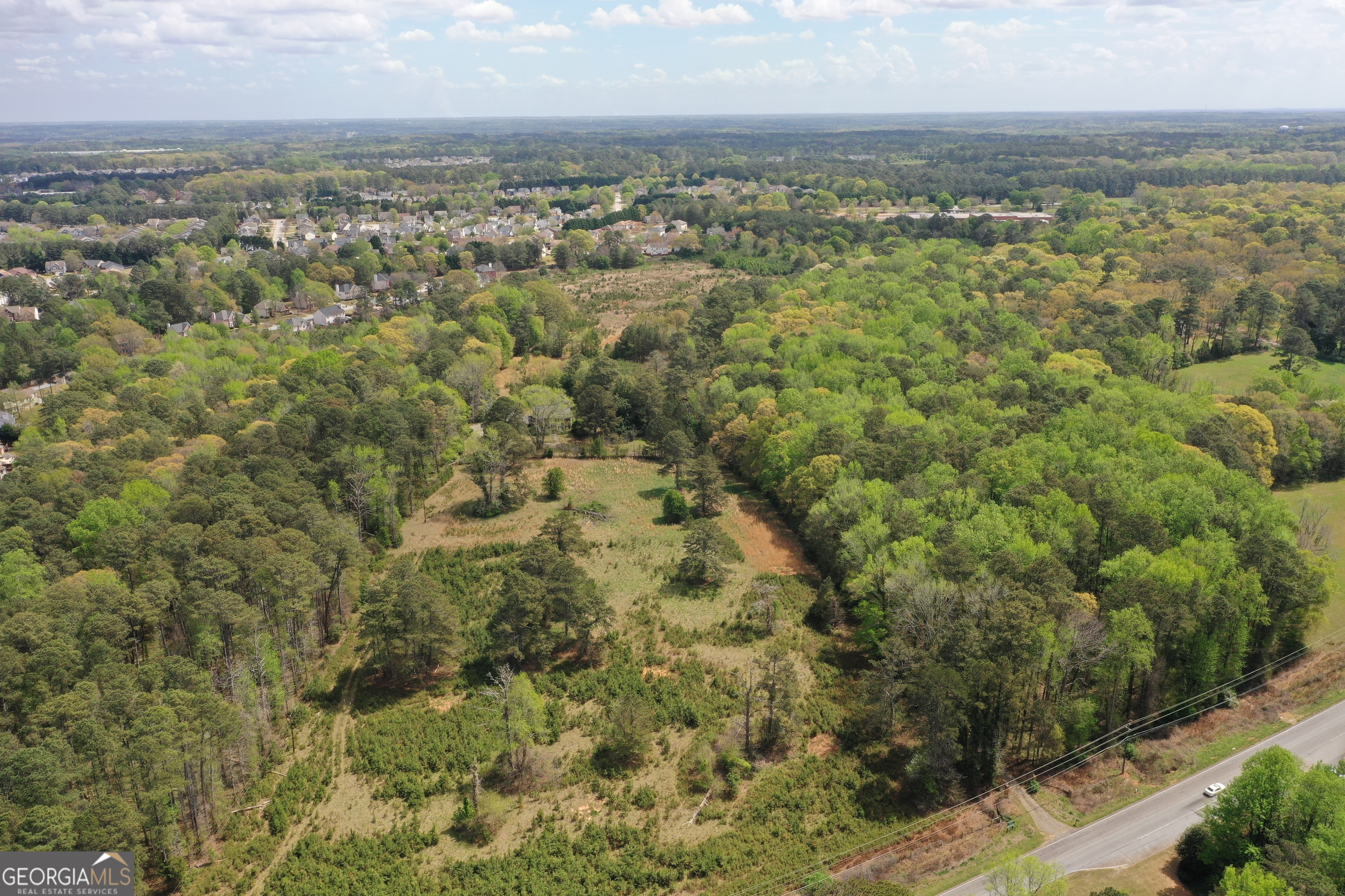 2660 Old Salem Road Southeast Conyers, GA 30013 - Photo 5 of 7 an aerial view of residential houses with outdoor space