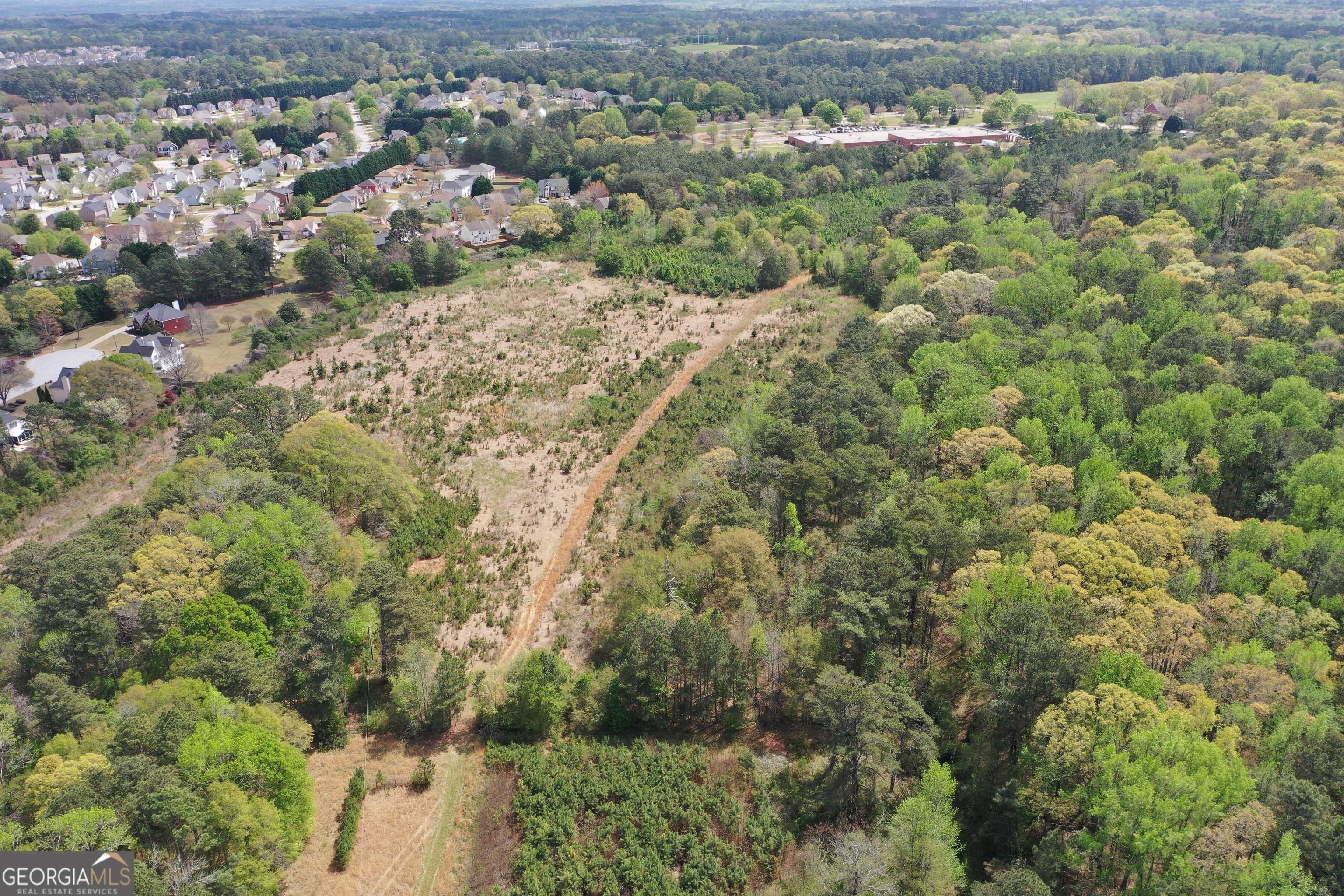 2660 Old Salem Road Southeast Conyers, GA 30013 - Photo 6 of 7 an aerial view of a houses with a yard