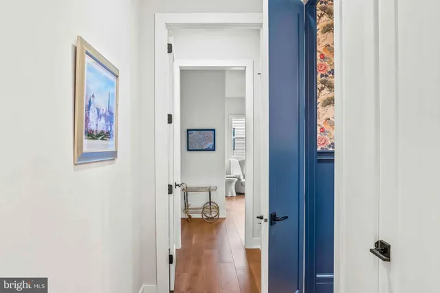 a bedroom with a bed and a bookshelf