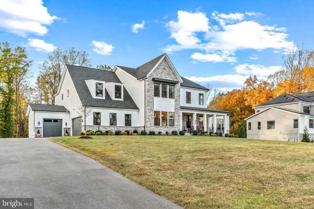 a front view of residential houses with yard