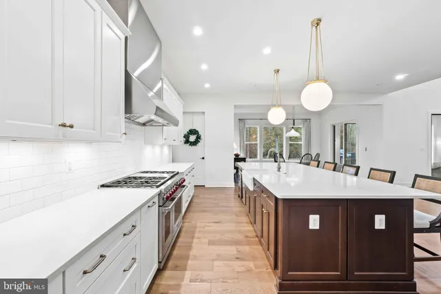 a bathroom with a sink and vanity