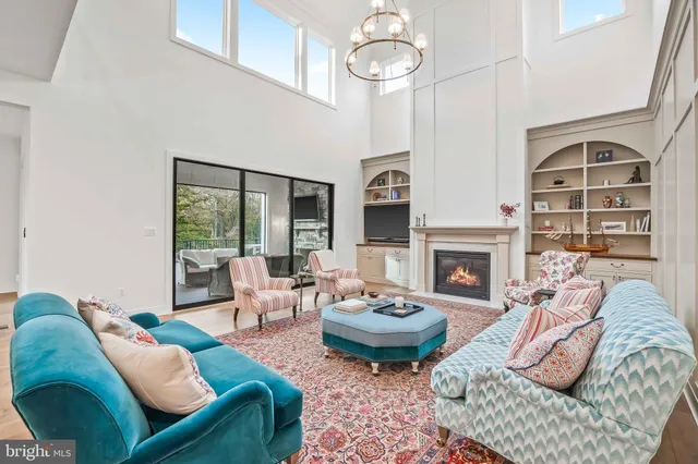a bathroom with a tub a sink and a mirror