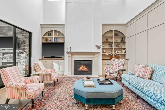 a bathroom with a tub sink shower and mirror