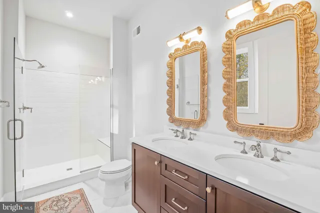 a living room with hard wood floors and a table