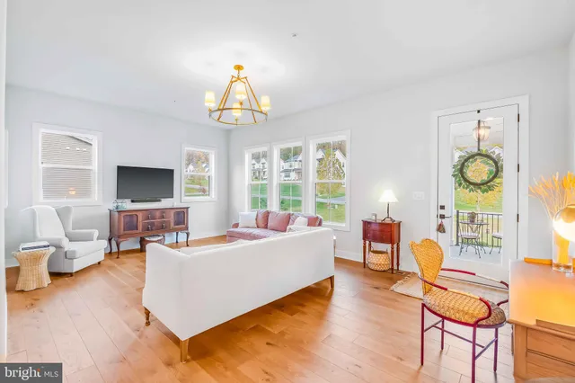 a bathroom with a sink mirror vanity and toilet