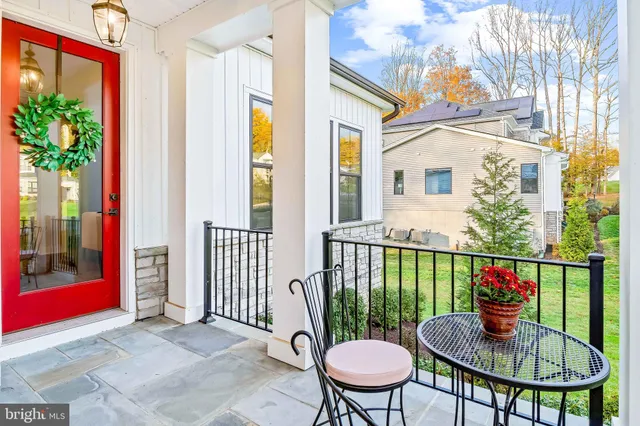 a large kitchen with lots of counter space and stainless steel appliances