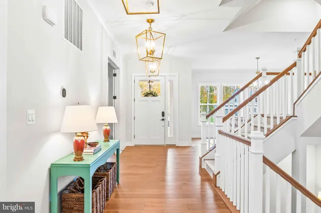 a kitchen with stainless steel appliances granite countertop a stove and a microwave