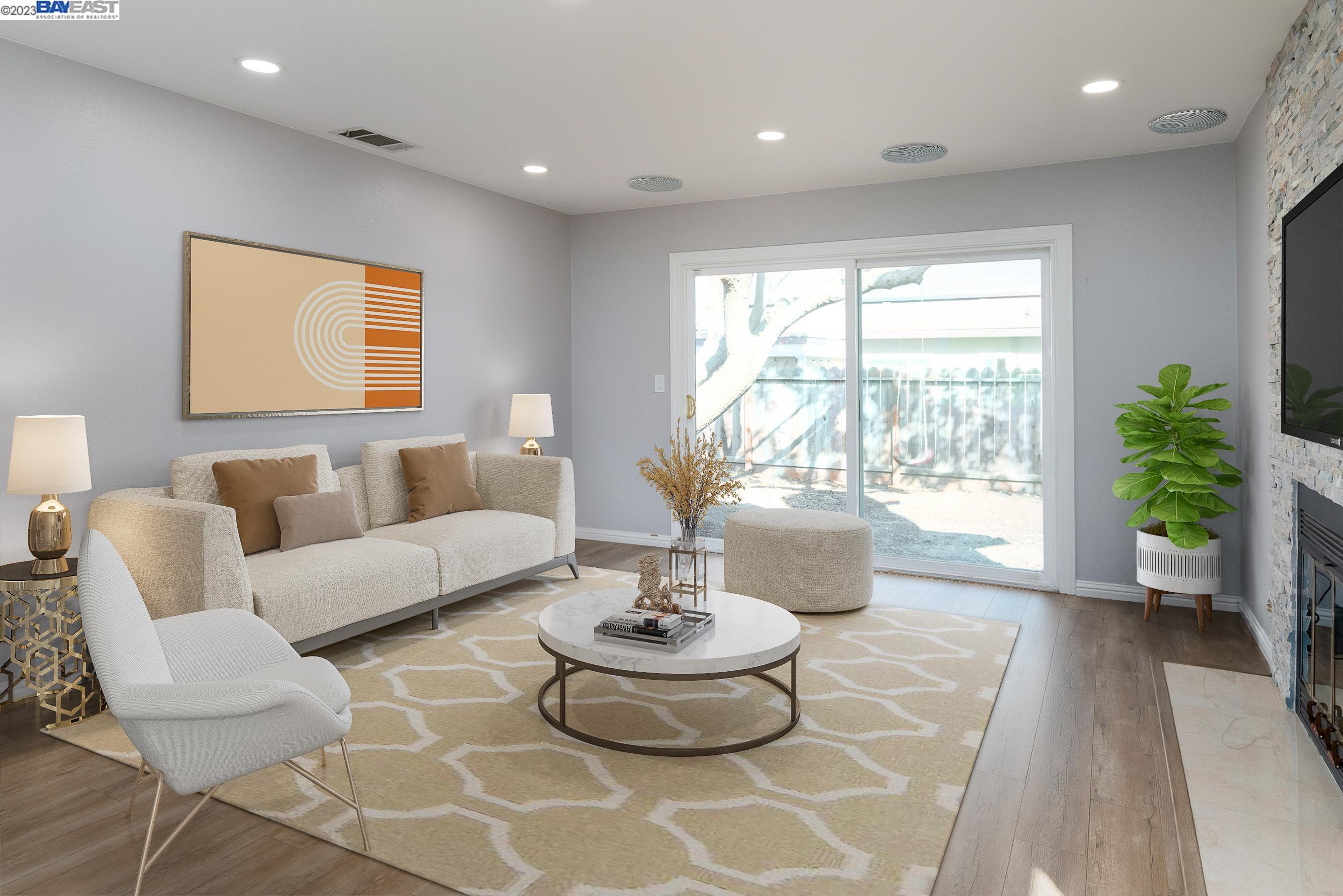 1013 Arrowhead Avenue Livermore, CA 94551 - Photo 1 of 1 a living room with furniture and a large window
