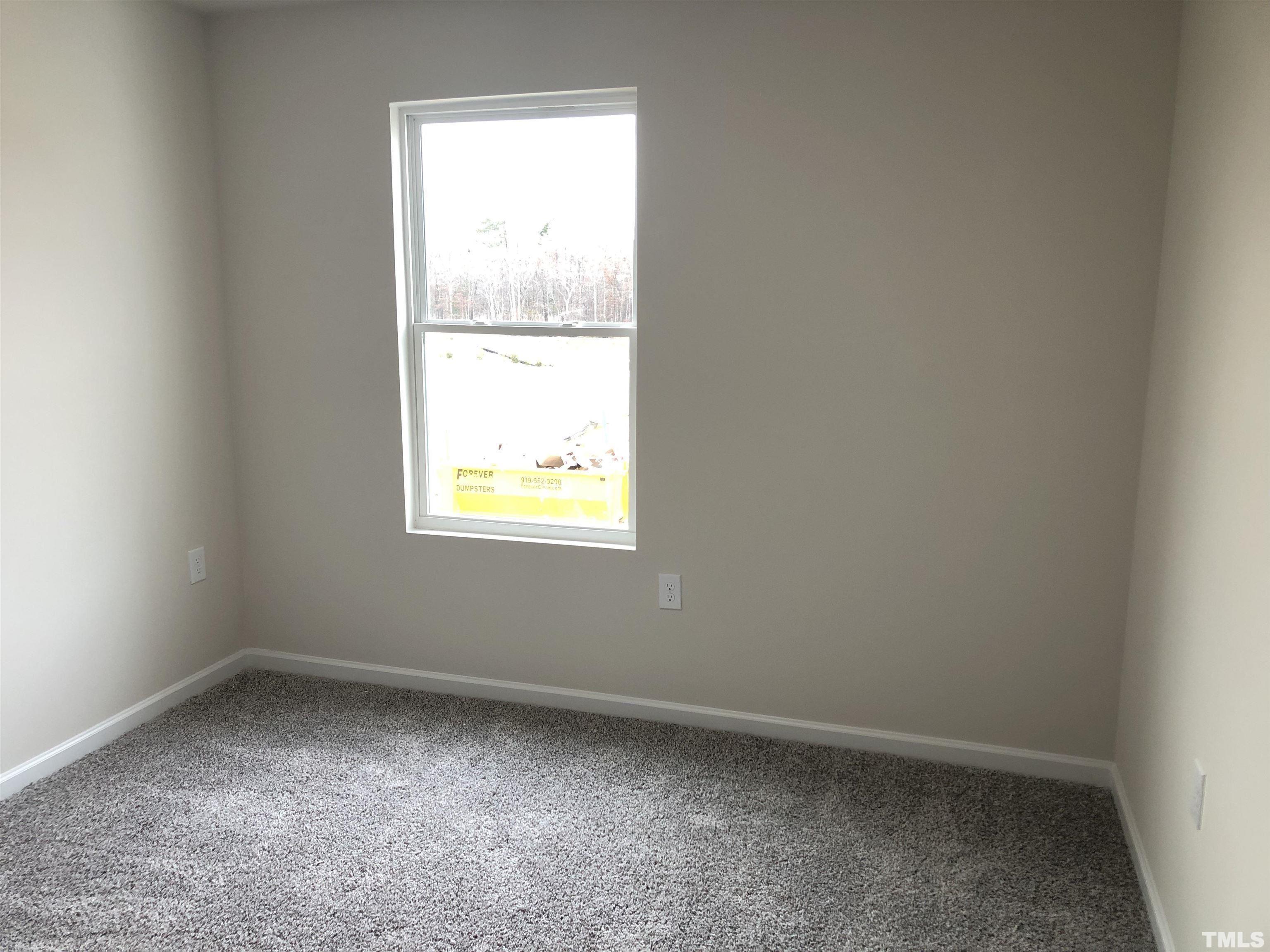 159 Red Valor Street Garner, NC 27529 - Photo 15 of 24 an empty room with a window