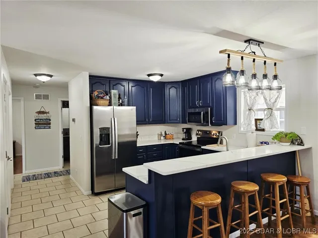 $594,500 | 8255 Clover Road, Gravois Mills, MO 65037