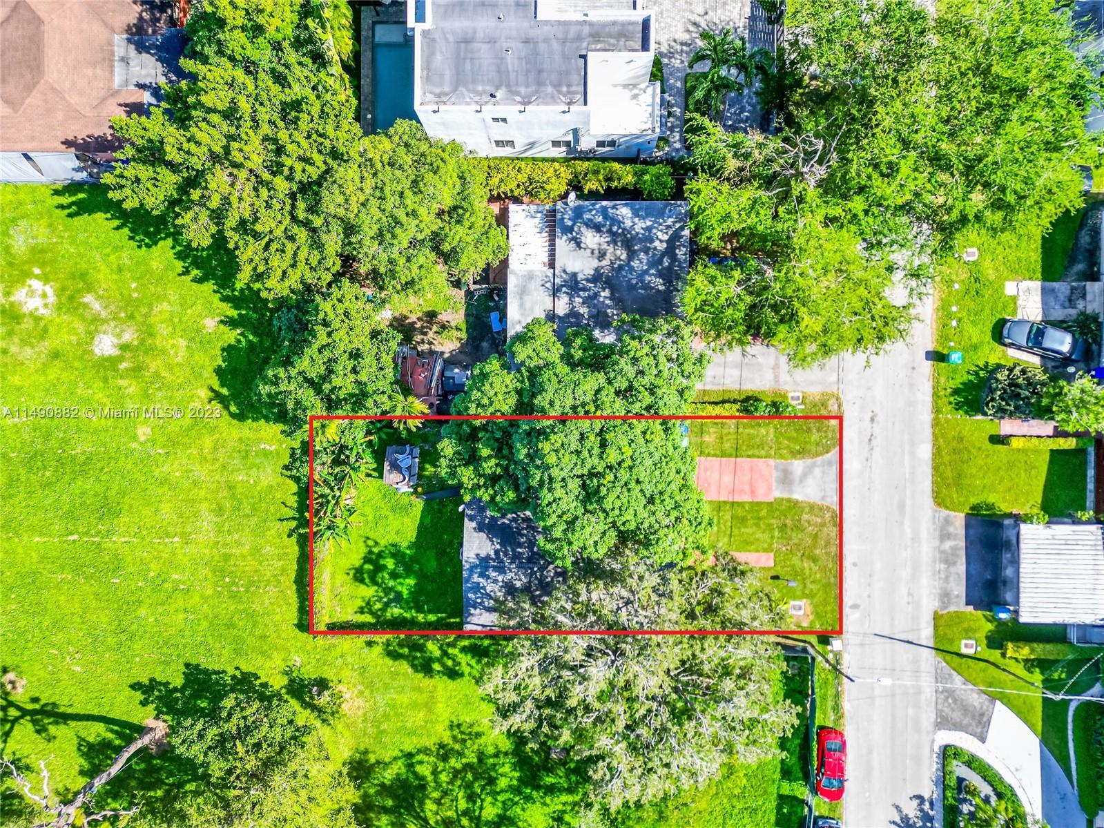 3551 Frow Avenue Miami, FL 33133 - Photo 21 of 22 an aerial view of a house with a yard