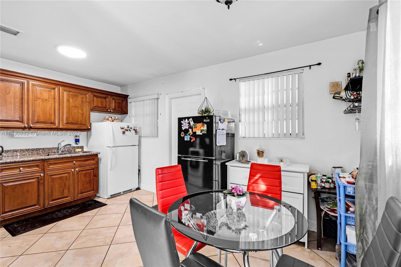 3551 Frow Avenue Miami, FL 33133 - Photo 5 of 22 a view of a kitchen with workspace and a window