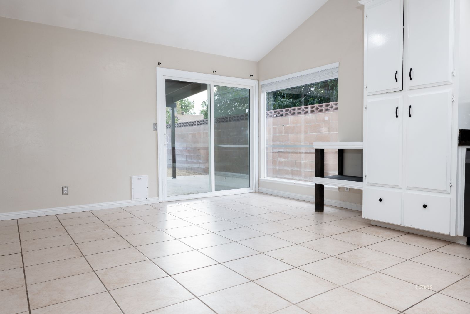 321 Mari Court Ridgecrest, CA 93555 - Photo 10 of 26 a view of a livingroom with an empty space and a window