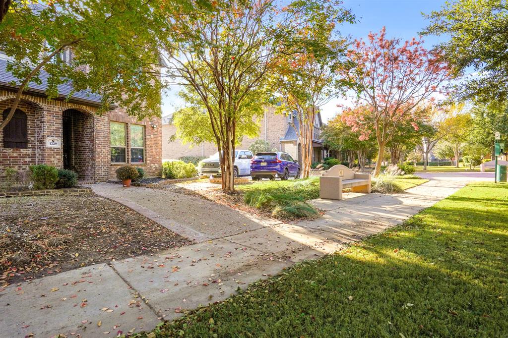 1229 Harris Hawk Way Arlington, TX 76005 - Photo 27 of 40 a view of a house with a yard and tree s