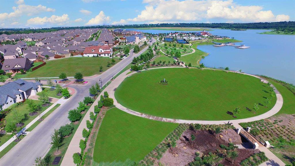 1229 Harris Hawk Way Arlington, TX 76005 - Photo 36 of 40 a view of a swimming pool with a garden