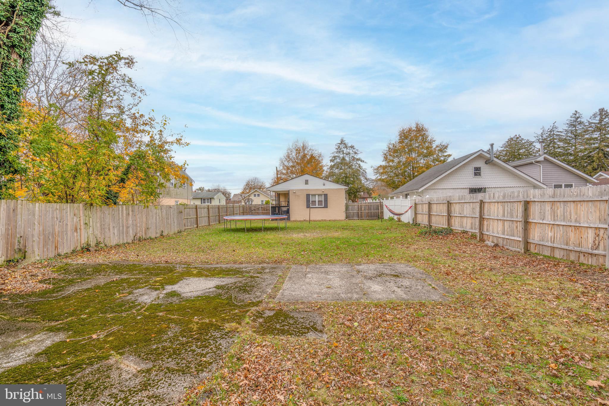 519 Clarendon Avenue Vineland, NJ 08360 - Photo 22 of 22 a view of a house with a yard and sitting area