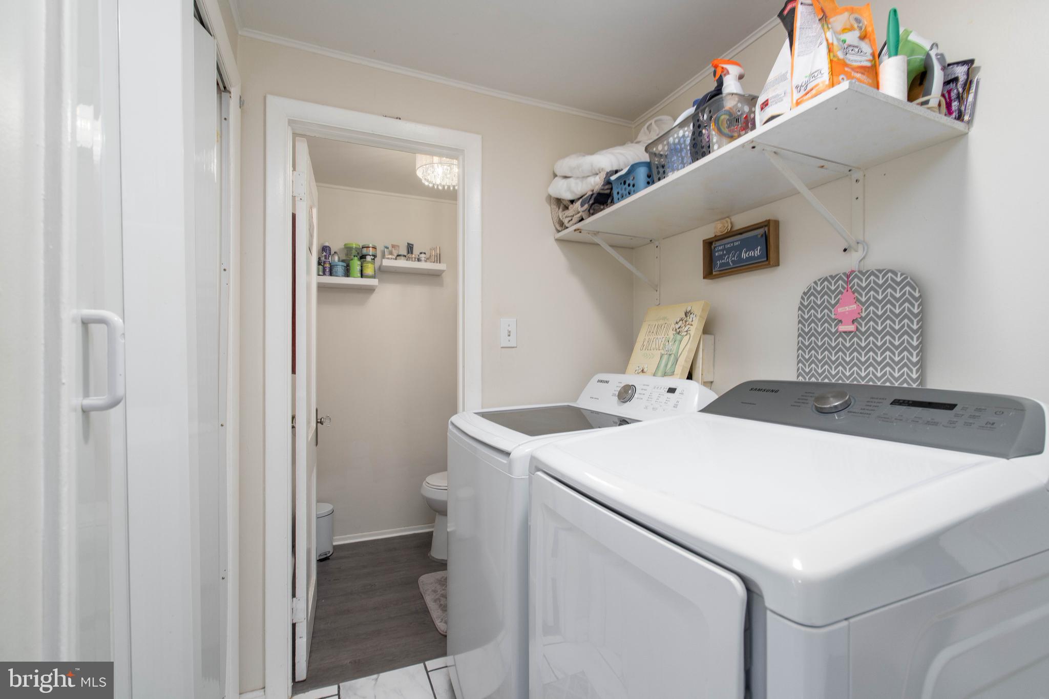 519 Clarendon Avenue Vineland, NJ 08360 - Photo 8 of 22 a utility room with dryer and washer