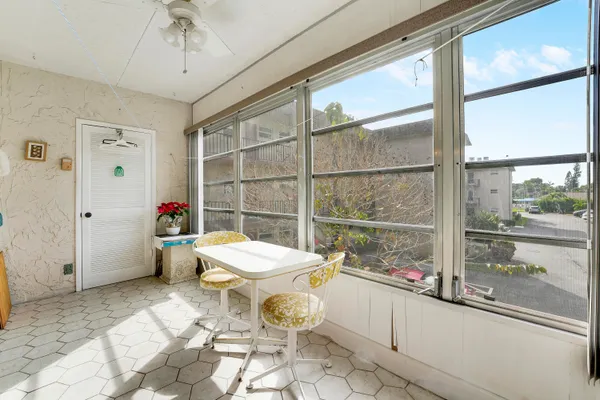 a bathroom with a toilet sink and shower