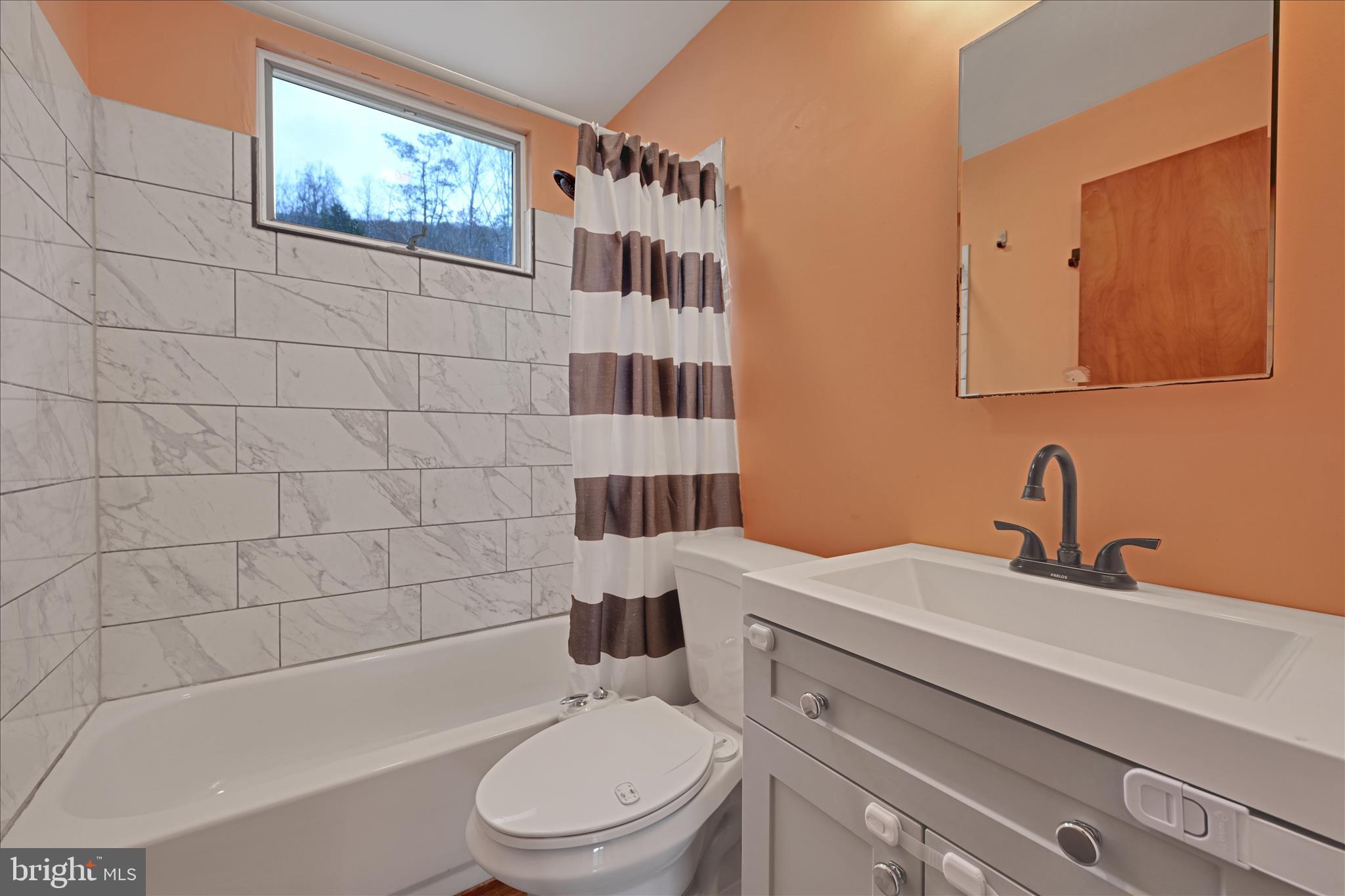 1012 Fountain Street Ashland, PA 17921 - Photo 19 of 34 a bathroom with a sink a toilet and shower