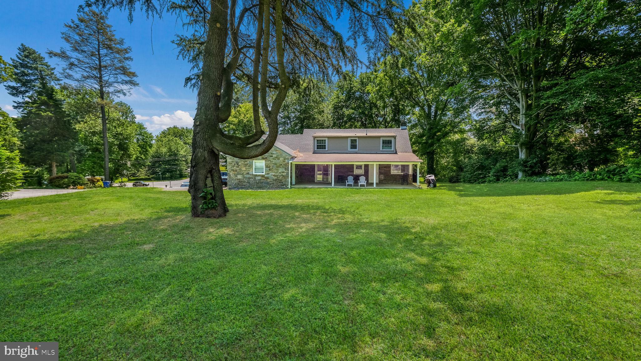 160 North State Road Springfield, PA 19064 - Photo 40 of 41 Rear lawn looking at porch