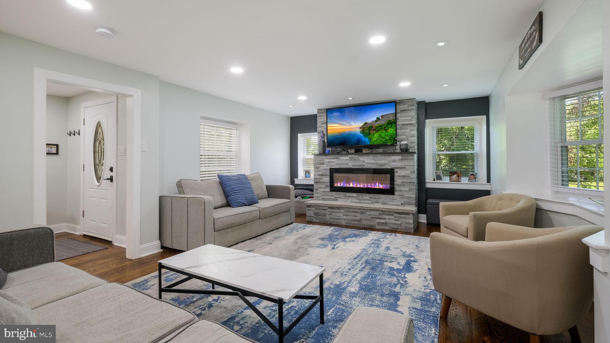 160 North State Road Springfield, PA 19064 - Photo 8 of 41 Open concept living room with electric fire place
